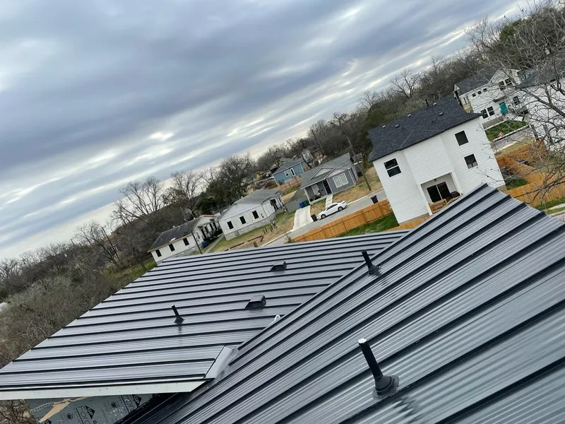 Standing seam metal roof panels with vents for Skylight Repair in River Ridge